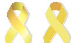 Dag tegen kanker: draag een geel lintje als teken van solidariteit