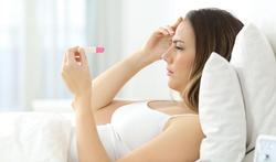 Barre très pâle sur mon test de grossesse : c'est positif ?
